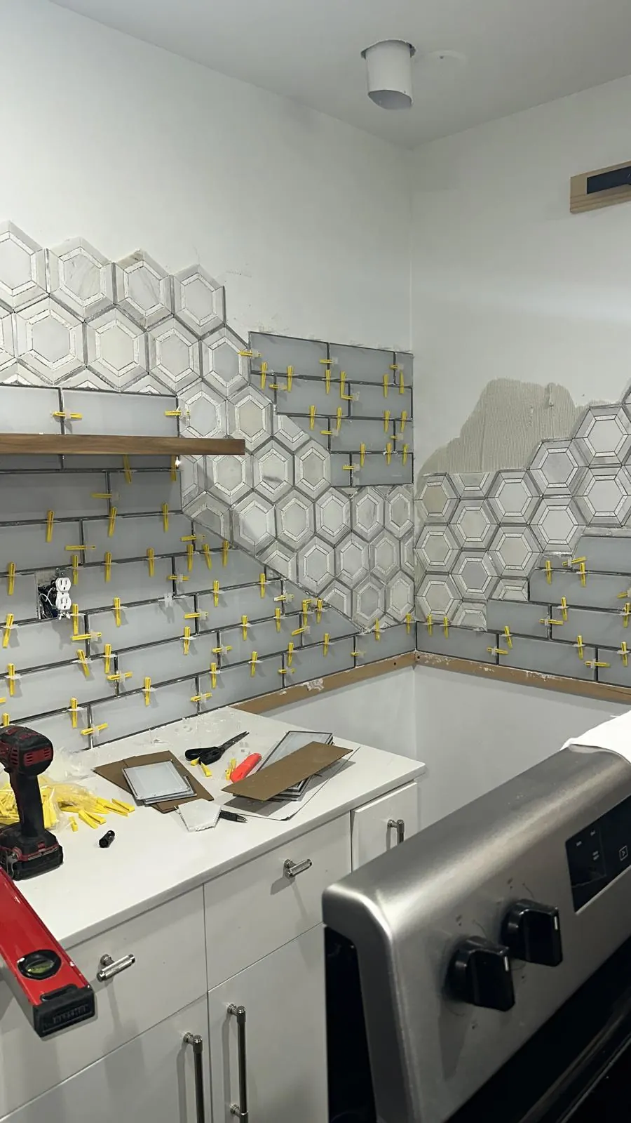 Kitchen tile installation in progress